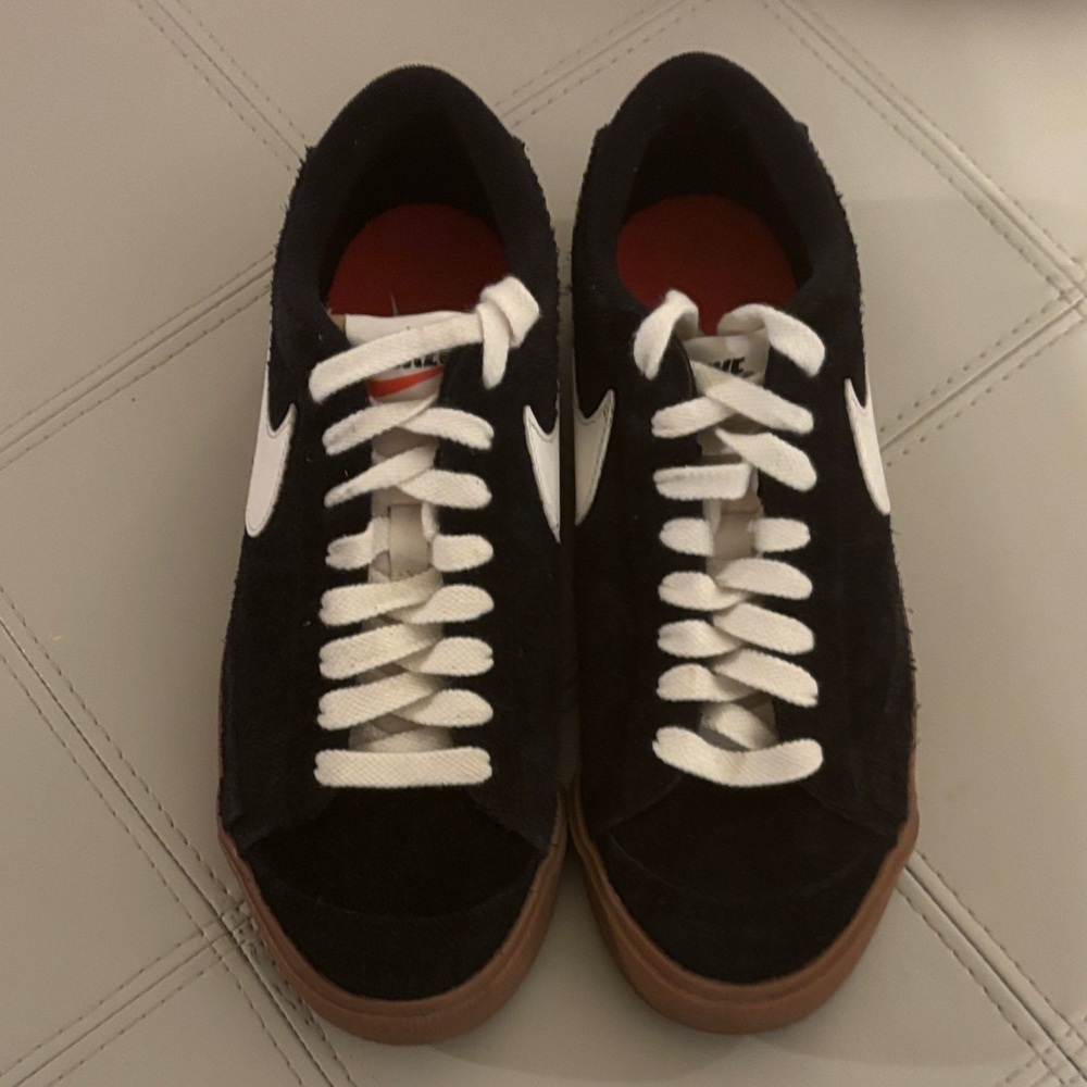 Nike women’s Black and White Sneakers with Brown Sole